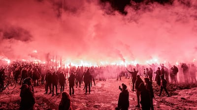 People take part in a tribute to a 16-year-old who died in a fireworks accident on New Year's Eve, in Nijmegen, the Netherlands. EPA