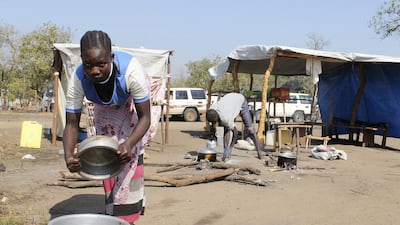 A South Sudanese refugee cooks food at a restaurant in the Bidi Bidi refugee camp in Uganda. Justin Lynch / AP Photo / December 13, 2016