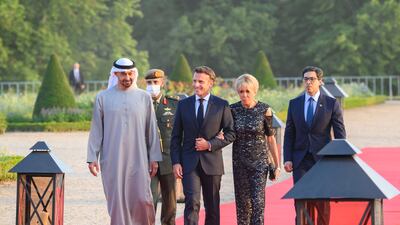 Sheikh Mohamed, Mr Macron, Mrs Macron and Sheikh Mansour bin Zayed Al Nahyan, UAE Deputy Prime Minister and Minister of the Presidential Court.