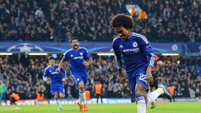 Chelsea’s Willian begins to celebrate after scoring his side’s second goal in their 2-1 victory in the Champions League on Wednesday night. Glyn Kirk / AFP