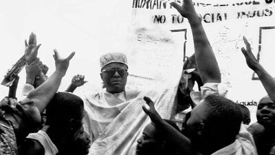 Ganiyu Oyseola Fawehinmi is surrounded by supporters at a pro-democracy rally in 1998 in Lagos.