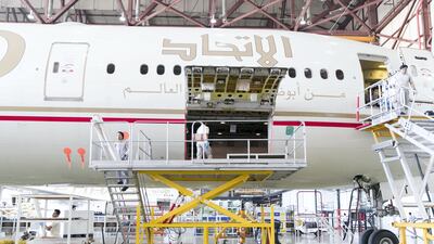An Etihad Airways aircraft inside a hanger at Etihad Airways Engineering's facilities in Abu Dhabi Reem Mohammed/The National