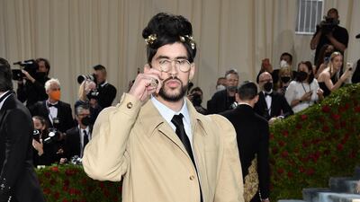 Bad Bunny, wearing a Burberry ensemble. AP Photo