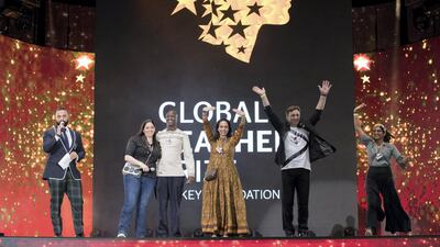 Some of this year's finalists in the Global Teacher Prize take to the stage. Courtesy: Global Education & Skills Forum