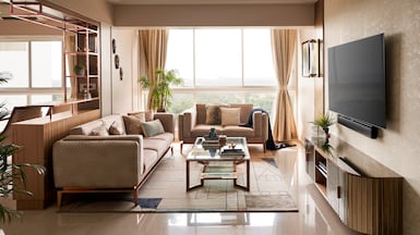 To make a studio apartment appear more spacious, experts suggest placing main furniture on top of a big carpet and partitioning the space to separate living and sleeping areas. Photo: Jaipur Rugs