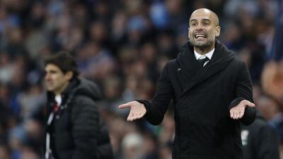 Manchester City manager Pep Guardiola, right, and Middlesbrough counterpart Aitor Karanka. Darren Staples / Reuters