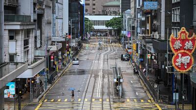 Central district in Hong Kong is almost deserted as Typhoon Wipha moves in on July 20. AFP