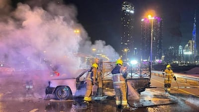 One of two vehicles that caught fire on Dubai’s Ras Al Khor Road. Courtesy Dubai Civil Defence