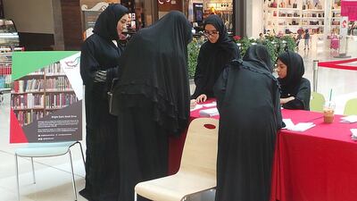 Volunteers help out at a book fair held at the Fujairah City Centre mall. Photo courtesy Fujairah Book Fair