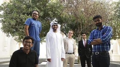 The Hackathon Fintech event’s winning team, Sahim, included, from left to right: Wasi Rehman, 16; Saif Rehman, 22; Hashim Alzaabi, 23; Abdulla Alhajkhalil, 22; Vinay Naresh, 22; and Mohamed Rashid, 23. Jeffrey E Biteng / The National