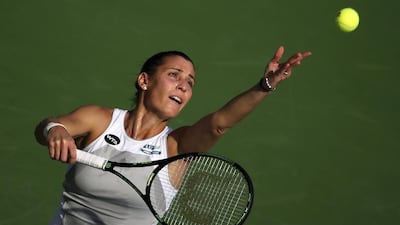 Flavia Pennetta serves during the Dubai Duty Free Tennis Championships in Dubai earlier this year. Karim Sahib / AFP / February 15, 2015