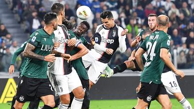 Juventus' Cristiano Ronaldo (C) in action during the Italian Serie A soccer match between Juventus FC and Bologna FC in Turin, Italy. EPA