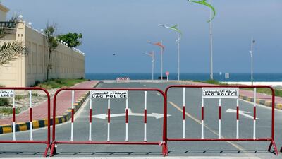 A beach in Umm Al Quwain is closed off due to the Covid-19 outbreak. Chris Whiteoak / The National