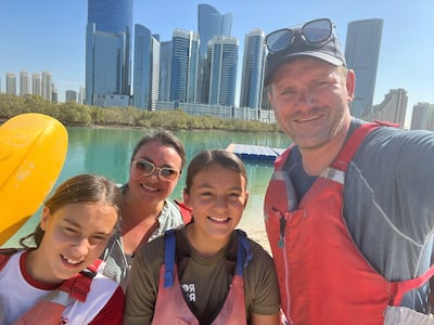 The Johnson family, Naja, Juliane, Emma and Phil, enjoying a kayak trip in Abu Dhabi. Phil Johnson / The National