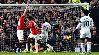 Manchester United striker Danny Welbeck, second left, scores his team's second goal during a 2-0 defeat of Swansea City at Old Trafford on Saturday. Andrew Yates / AFP