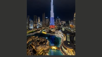 Dubai's Burj Khalifa, the world's tallest skyscraper, lit up in the colours of the Russian flag.