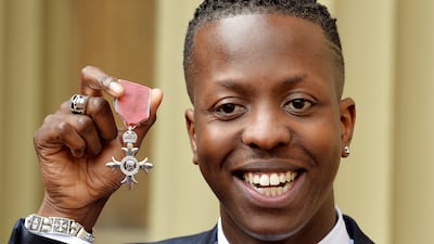 British music entrepreneur Jamal Edwards, pictured above holding his MBE award, has died at the age of 31. PA
