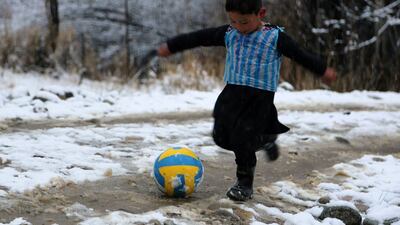 Murtaza Ahmadi became an Internet sensation after wearing a plastic bag Lionel Messi Argentina shirt went viral. AFP