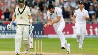 England's James Anderson, centre, celebrates after bowling out Australia's captain Michael Clarke.
