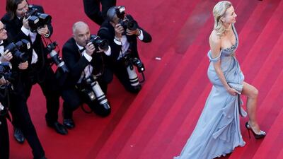 Naomi Watts poses on the red carpet as she arrives for the screening of the film How to Train Your Dragon 2 out of competition at the 67th Cannes Film Festival in Cannes 16 May, 2014. Reuters