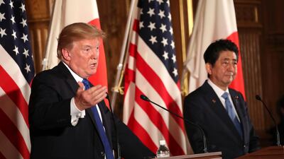 US president Donald Trump, left, speaks as Japanese prime minister Shinzo Abe, right, looks on during a joint news conference at the Akasaka Palace in Tokyo. Trump is on a five-country trip through Asia traveling to Japan, South Korea, China, Vietnam and the Philippines. Andrew Harnik / AP Photo