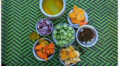 Mohammed, 27, a labourer at a brick factory sharing iftar with coworkers at a brickmaking factory on the outskirts of Islamabad, Pakistan on June 14, 2016. “For me Ramadan is a test and this is God’s will. We should obey God’s commands so that we are successful,” Mohammed says. Photo by Faisal Mahmood