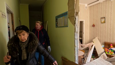 Inside a shell-damaged school in Kyiv. AP