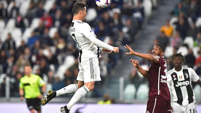 Cristiano Ronaldo scores a headed equaliser against Torino. EPA