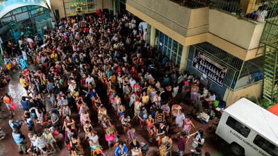 Residents queuing to register at an evacuation centre as they prepare to shelter from Super Typhoon Fung-Wong, in Manila, the Philippines. Reuters