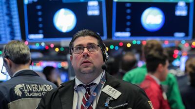 A trader works on the floor of the New York Stock Exchange. The decisions being made this month in Vienna, London and Washington will all affect the markets. Photo: Reuters