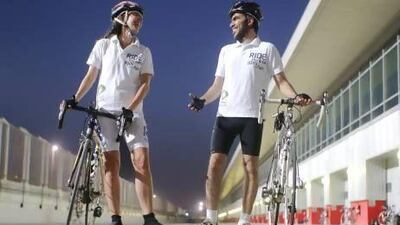 Sara Coppo of Italy and Emirati Faisal Al Reyaysa, Etisalat workers living in Dubai, have qualified for a 2,100km, 13-day tour from Brussels to Barcelona that will test both their endurance, and a mobile-phone monitoring and management system for diabetics. Lee Hoagland / The National