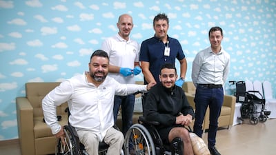 Mohamed Elmadhoun, 18, front row right, had a prosthetic leg fitted at Emirates Humanitarian City. The Palestinian teenager lost his limb in violence in Gaza. All photos: Victor Besa / The National