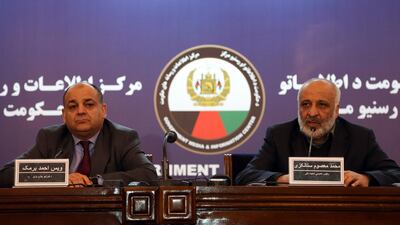 Afghanistan's intelligence chief Masoom Stanekzai, right, and Interior Minister Wais Barmak address a press conference in Kabul on February 1, 2018. Rahmat Gul / AP Photo