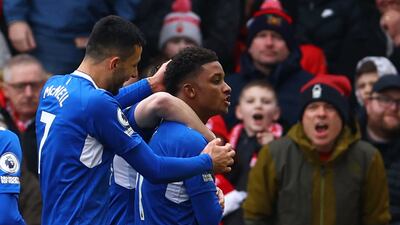 Everton's Demarai Gray celebrates scoring their opener with Dwight McNeil. Reuters