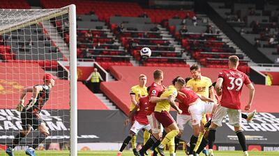 James Tarkowski scores for Burnley. PA