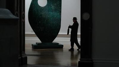 A man walks past Barbara Hepworth’s sculpture Single Form at the Modern British Sculpture exhibition at London’s Royal Academy.