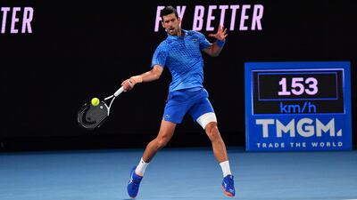 Serbia's Novak Djokovic hits a return against Spain's Roberto Carballes. AFP