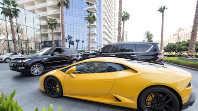 The Lamborghini parked outside a five star hotel on the Palm. Leslie Pableo for The National