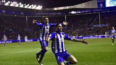Alaves' Edgar Mendez, right, celebrates with Iabi Gomez, after Mendez scored against Celta Vigo on February 8, 2017. Alvaro Barrientos / AP