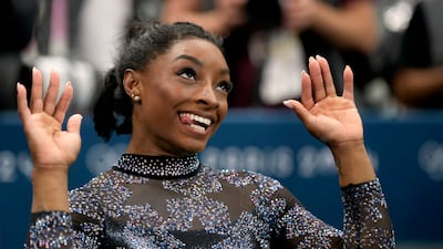 Simone Biles excelled during qualification despite an injury scare. AP