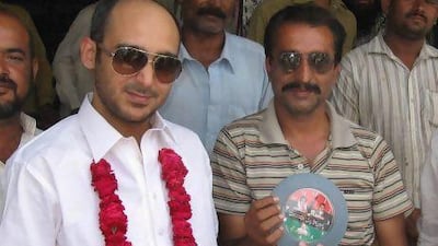 Ali Haider Gilani, (left), an election candidate and the son of former Prime Minister Yousuf Raza Gilani, with supporters just prior to his abduction.
