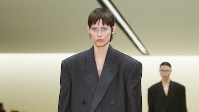 An oversized suit made out of trousers