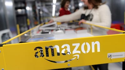 Workers at Amazon's logistics centre in Sady, near Poznan in Poland.EPA