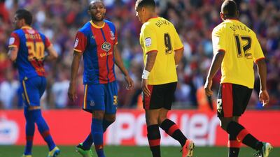 A few words were exchanged as well with Danny Gabbidon, second from left, the Crystal Palace player, having a go at Lloyd Doyley. Richard Heathcote / Getty Images