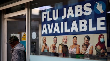 A sign advertising vaccinations at a London pharmacy as Britain and other European countries grapple with a severe flu season. Reuters
