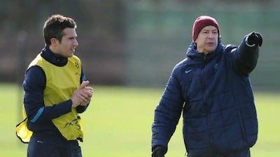 Arsene Wenger, right, is confident Robin van Persie will remain an Arsenal player after the end of the season.