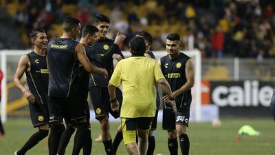 Maradona gives instructions to his players. Getty Images