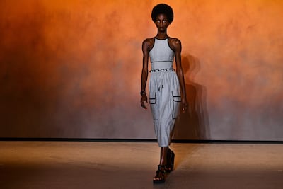 A model presents a creation for Hermes during the women's spring/summer 2022 ready-to-wear collection fashion show in Le Bourget, on the outskirts of Paris, as part of the Paris Fashion Week. AFP