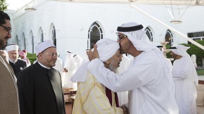 Sheikh Mohammed bin Zayed, Crown Prince of Abu Dhabi and Deputy Supreme Commander of the Armed Forces, greets HE Shaykh Abdallah bin Bayyah (C), while receiving a delegation of participants of the Forum for Promoting Peace in Muslim Societies, during a Sea Palace barza. Ryan Carter / Crown Prince Court — Abu Dhabi