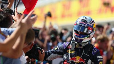 Daniel Ricciardo of Red Bull Racing celebrates in Parc Ferme after finsihing third in the Hungarian Grand Prix on Sunday. Clive Mason / Getty Images / July 26, 2015